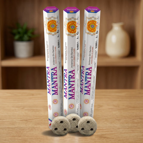 Aum Mantra bambooless incense sticks 3-pack with 3 metal coil holders on light oak wood surface