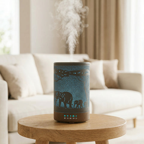 Elephant and Deer Metal Diffuser with teal LED safari elephant scene and wood base misting - Aroma Paradise