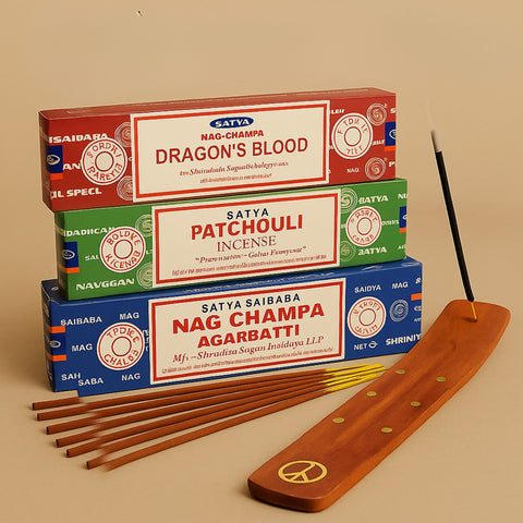 Satya incense boxes with Nag Champa, Patchouli, Dragon's Blood, and Incense Holder on a beige background