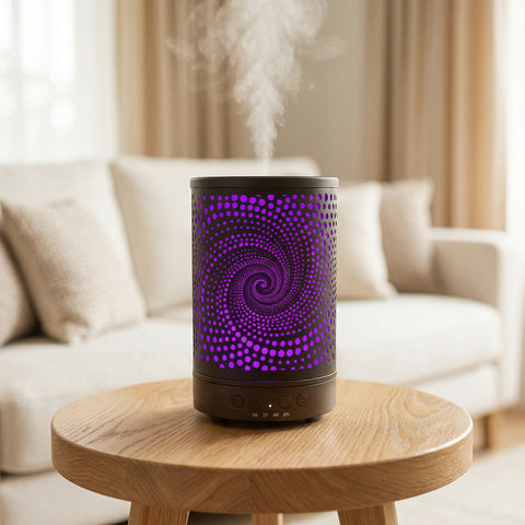 Vortex Metal Diffuser with purple LED spiral dot pattern on dark body misting on wood table - Aroma Paradise