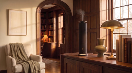 Black Fabric Tower waterless diffuser on a walnut ledge in a restored cream interior
