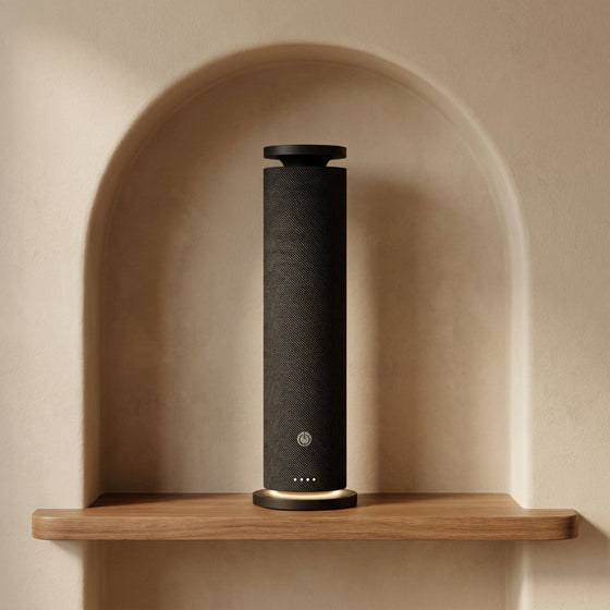 Black Fabric Tower waterless scent diffuser in an architectural niche lifestyle setting