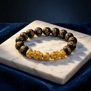Black Obsidian Double Dragon Wealth Bracelet — view 1