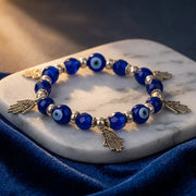 Evil Eye Bracelet - 8mm (Blue with charms) — view 1