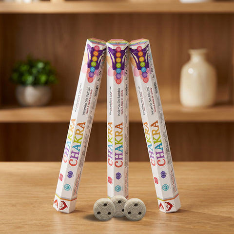 Aum Chakra bambooless incense sticks 3-pack with 3 metal coil holders on light oak wood surface