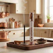 Aum Cinnamon bambooless incense stick burning in cozy kitchen with cinnamon sticks and cloves