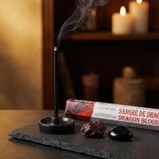 Aum Dragon Blood bambooless incense stick burning in mystical room with dragon blood resin and obsidian stone