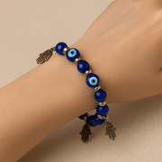 Evil Eye Bracelet - Beaded Design with Charms - 8mm - crystal lava stone bracelet - in use - Aroma Paradise