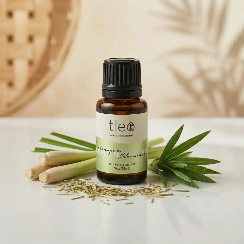 Tleio essential oil bottle with lemongrass on a light background
