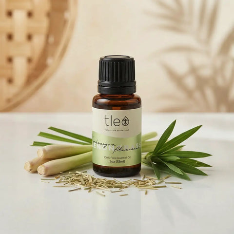 Tleio essential oil bottle with lemongrass on a light background