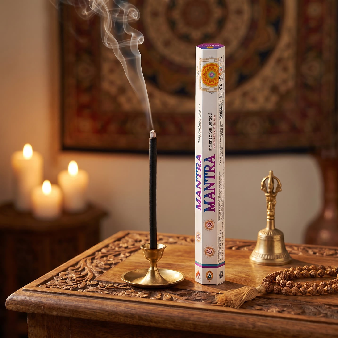 Aum Mantra bambooless incense stick burning in spiritual prayer space with brass bell and mala beads
