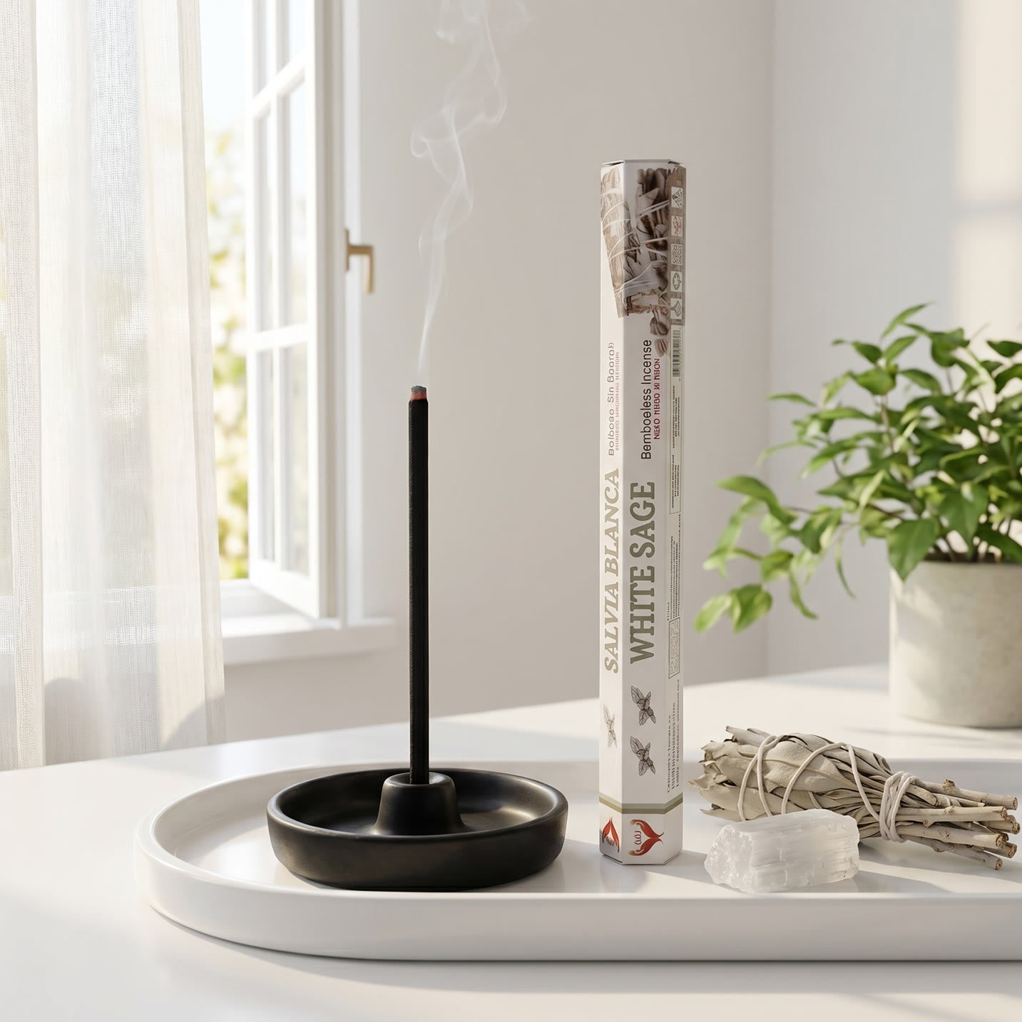 Aum White Sage bambooless incense stick burning in sunlit room with dried sage bundle and selenite crystal