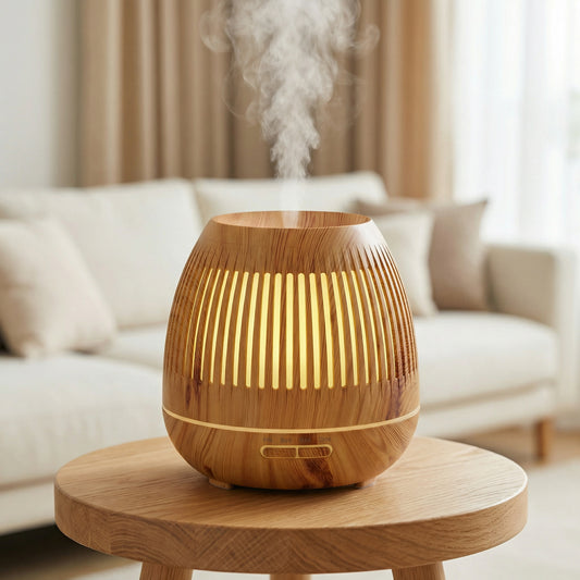 Light wood grain drum-shaped diffuser with slatted ventilation and warm LED on side table - Aroma Paradise