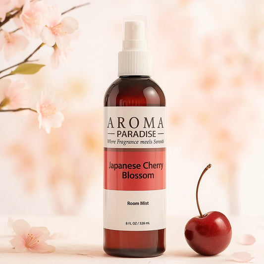 Bottle of Aroma Paradise Japanese Cherry Blossom room mist with cherry and floral background