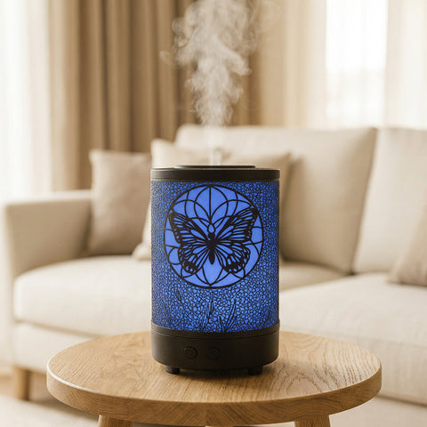 Dream Catcher Butterfly Metal Diffuser with blue LED butterfly web pattern on black body misting - Aroma Paradise