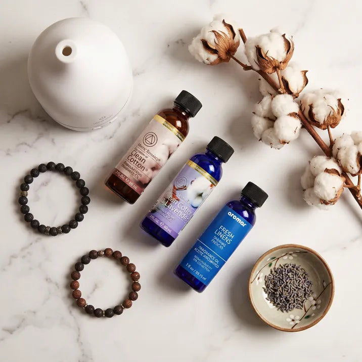 Fresh and Clean oil set flat lay with white diffuser cotton branch bracelets and dried lavender, Aroma Paradise