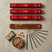 Hem Frankincense gift set flat lay with four red boxes, wooden holder, resin bowl, and matches - Aroma Paradise
