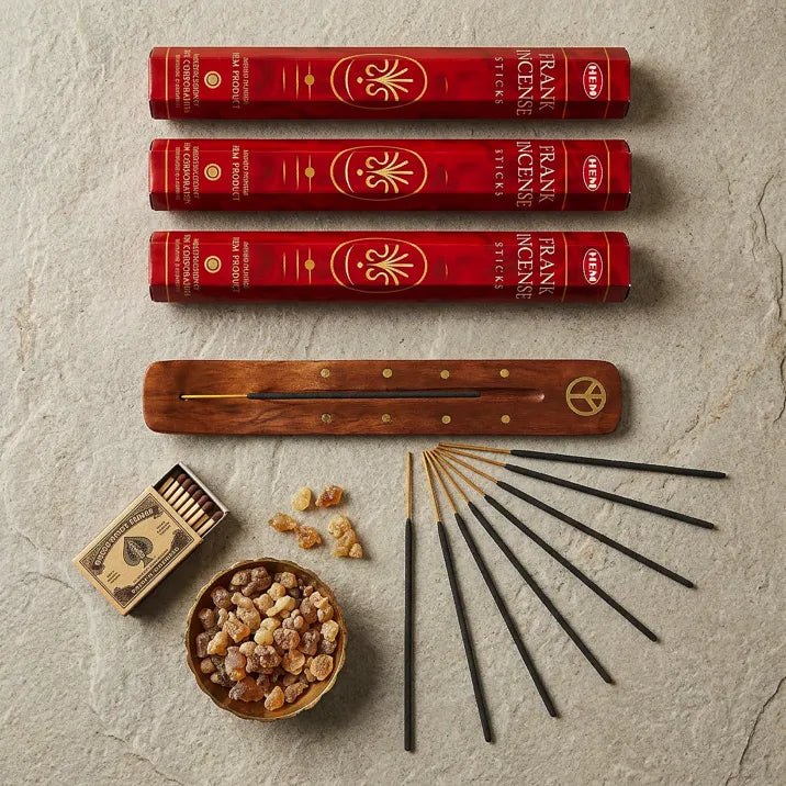 Hem Frankincense gift set flat lay with four red boxes, wooden holder, resin bowl, and matches - Aroma Paradise