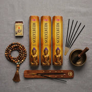 Hem Meditation gift set flat lay with three gold boxes, wooden holder, mala beads, and singing bowl - Aroma Paradise