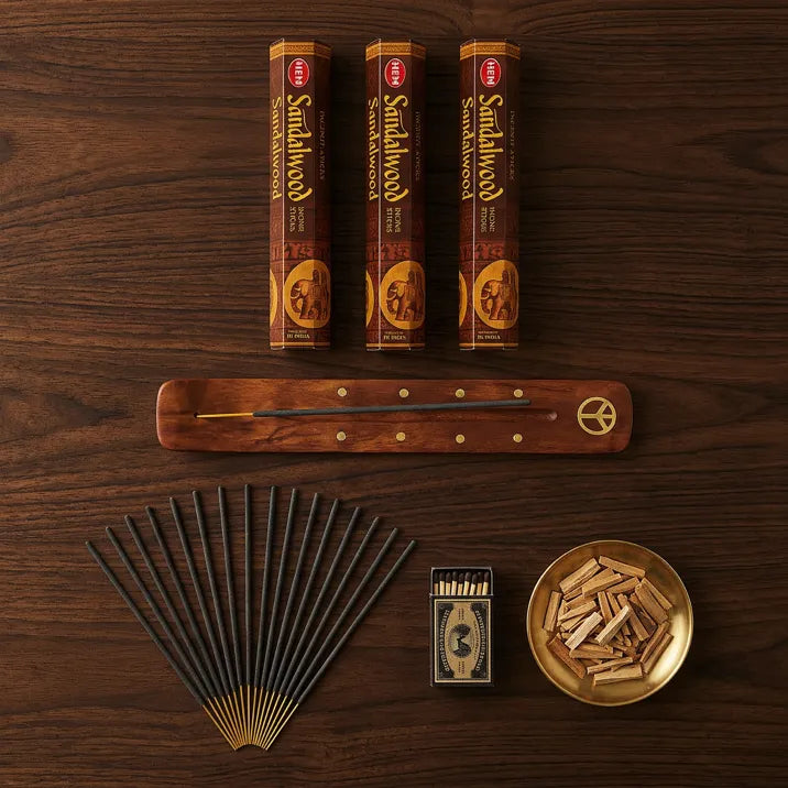 Hem Sandalwood gift set flat lay with three brown boxes, wooden holder, sticks, and sandalwood chips - Aroma Paradise