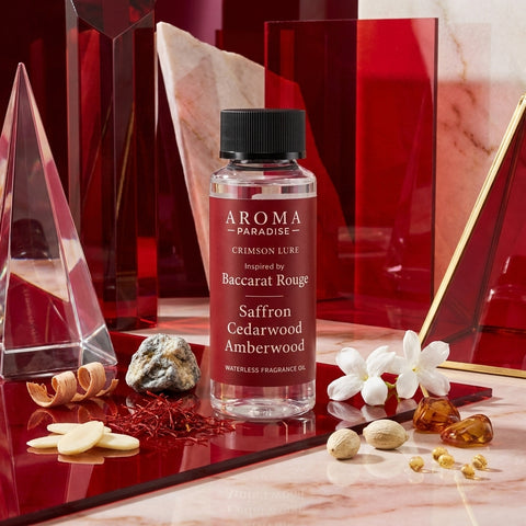 Aroma Paradise Crimson Lure perfume-inspired waterless fragrance oil in a luxury perfume editorial set