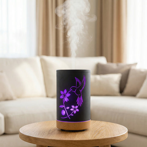 Hummingbird Metal Diffuser with purple LED hummingbird and flower cutout on black body with wood base - Aroma Paradise
