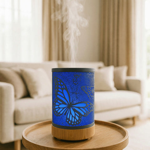 Large Butterfly Metal Diffuser with blue LED large butterfly wing shadow pattern on wood base - Aroma Paradise