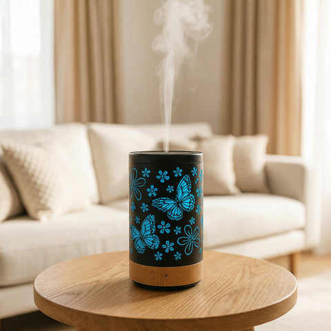 Small Butterfly Metal Diffuser with blue LED butterfly and flower cutout pattern on wood base - Aroma Paradise