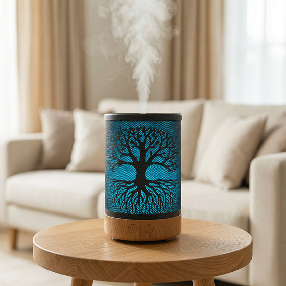 Tree of Life Metal Diffuser with blue LED tree and roots shadow pattern on wood base misting - Aroma Paradise
