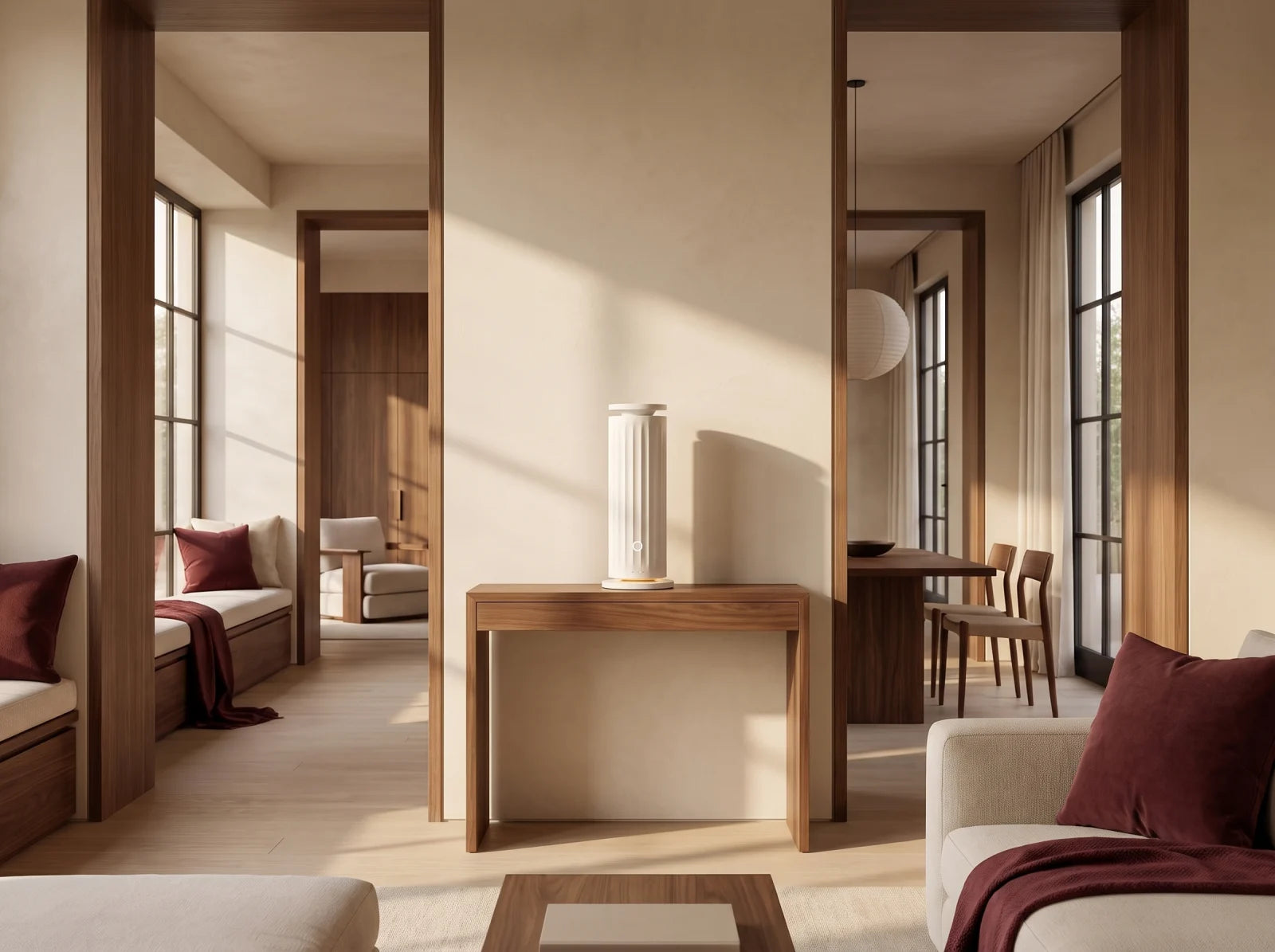 White waterless diffuser centered between connected living and dining spaces