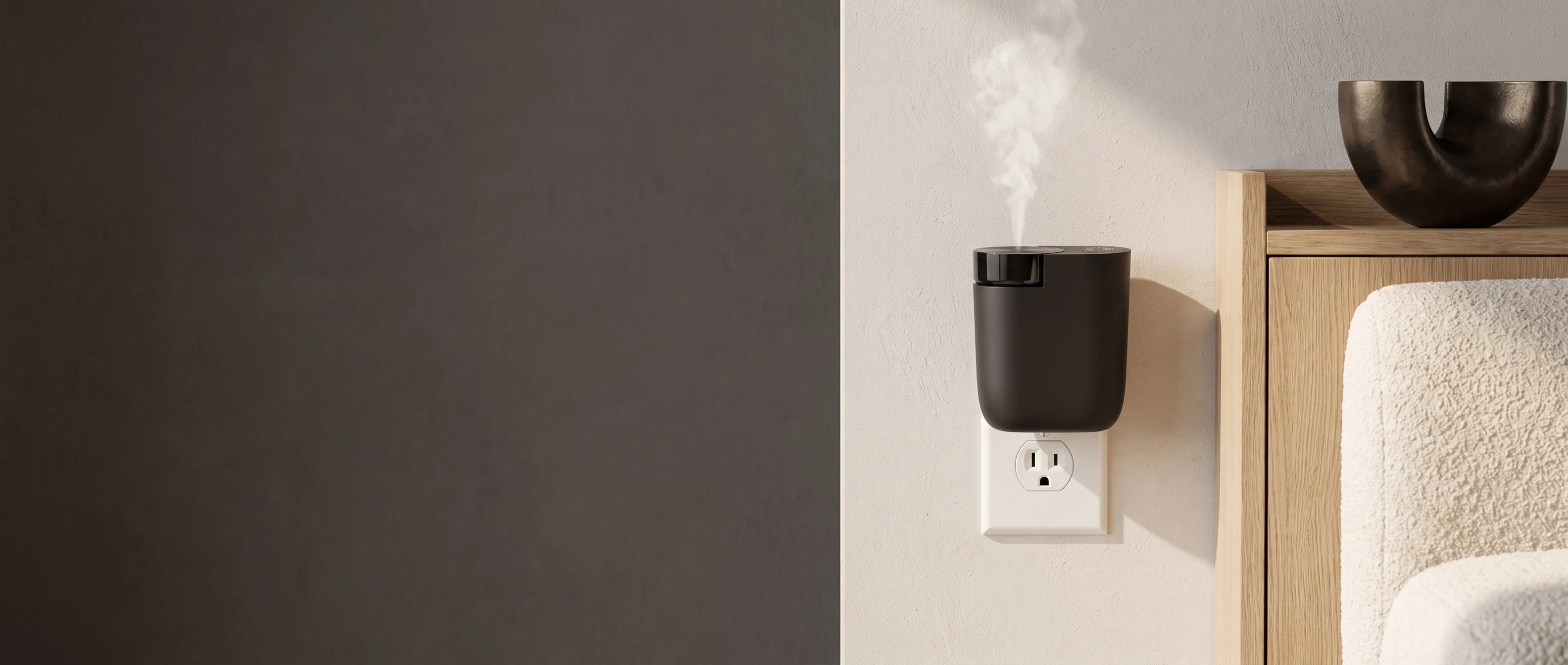 Black Contour Smart Plug-In waterless diffuser releasing a light scent mist in a warm modern living room