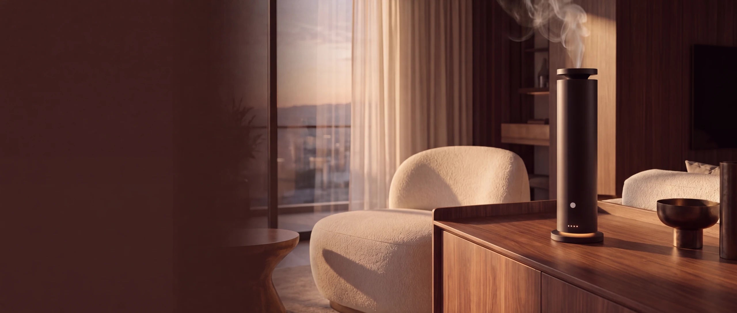 Black Tower Ultra rechargeable waterless scent diffuser releasing a soft scent plume in a warm modern living room